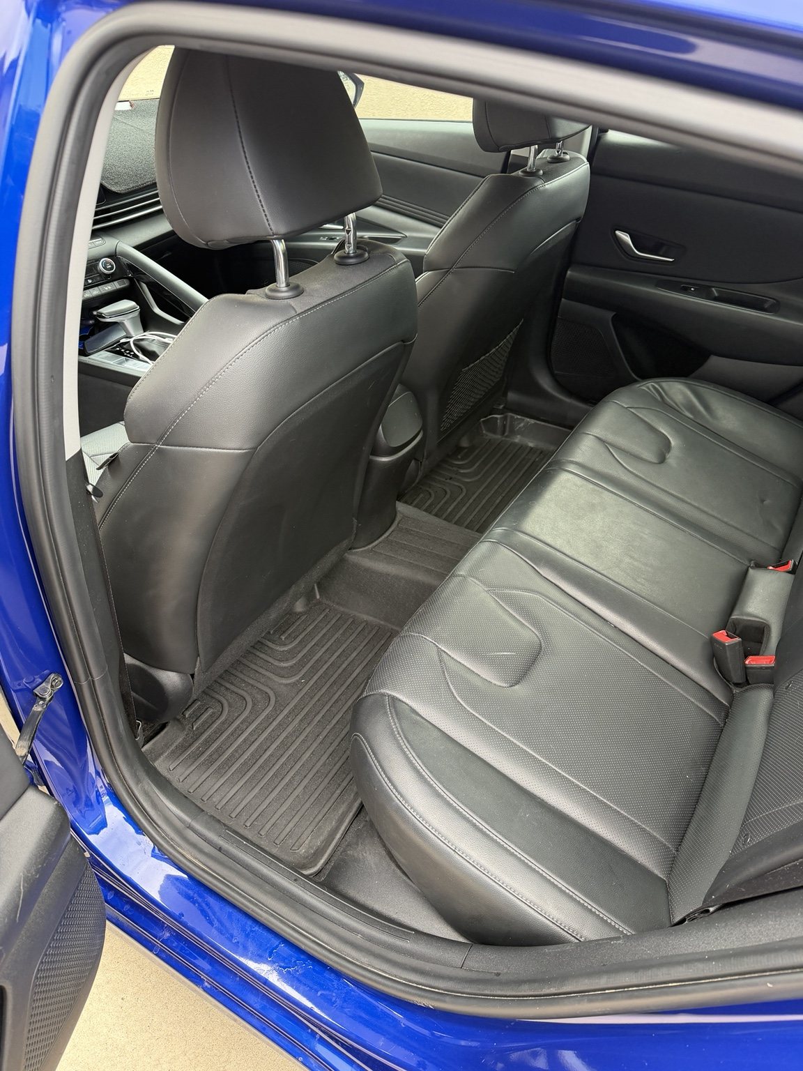 Clean Hyundai Elantra rear seating area with restored fabric and carpets